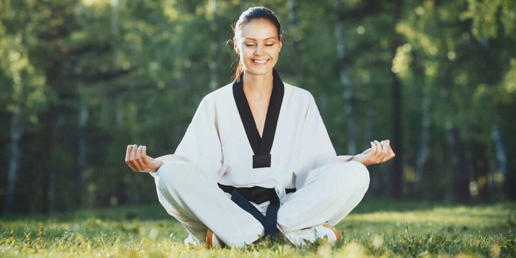 Martial Arts Lessons for Adults in hohokus NJ - Happy Woman Meditated Sitting Background