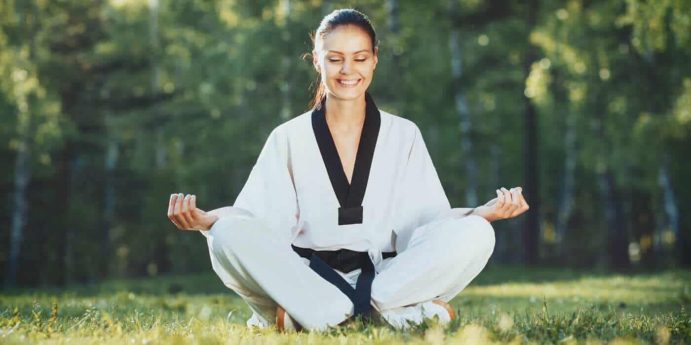Martial Arts Lessons for Adults in hohokus NJ - Happy Woman Meditated Sitting Background